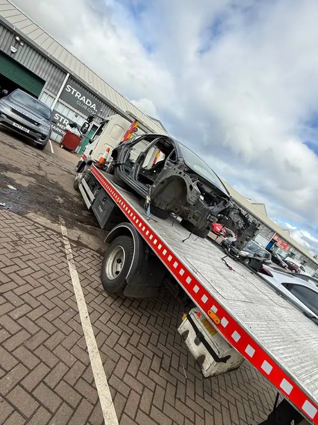 Stripped vehicle shell on the Lifesaver flatbed